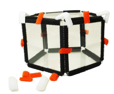 Pentagonal prism with orange velcro markers attached to its edges and white markers attached to its vertices